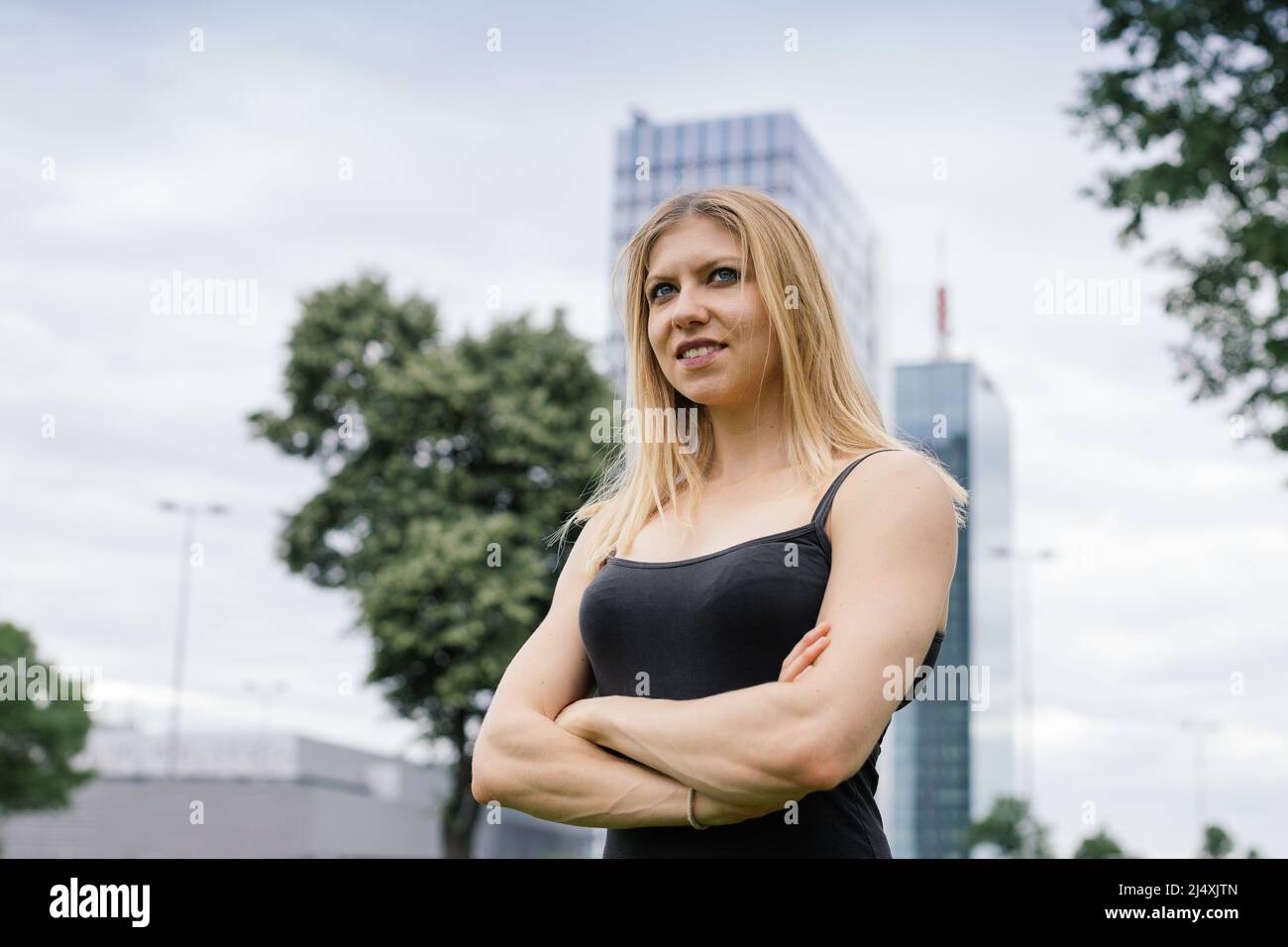 Muscular woman arms crossed hi-res stock photography and images - Alamy