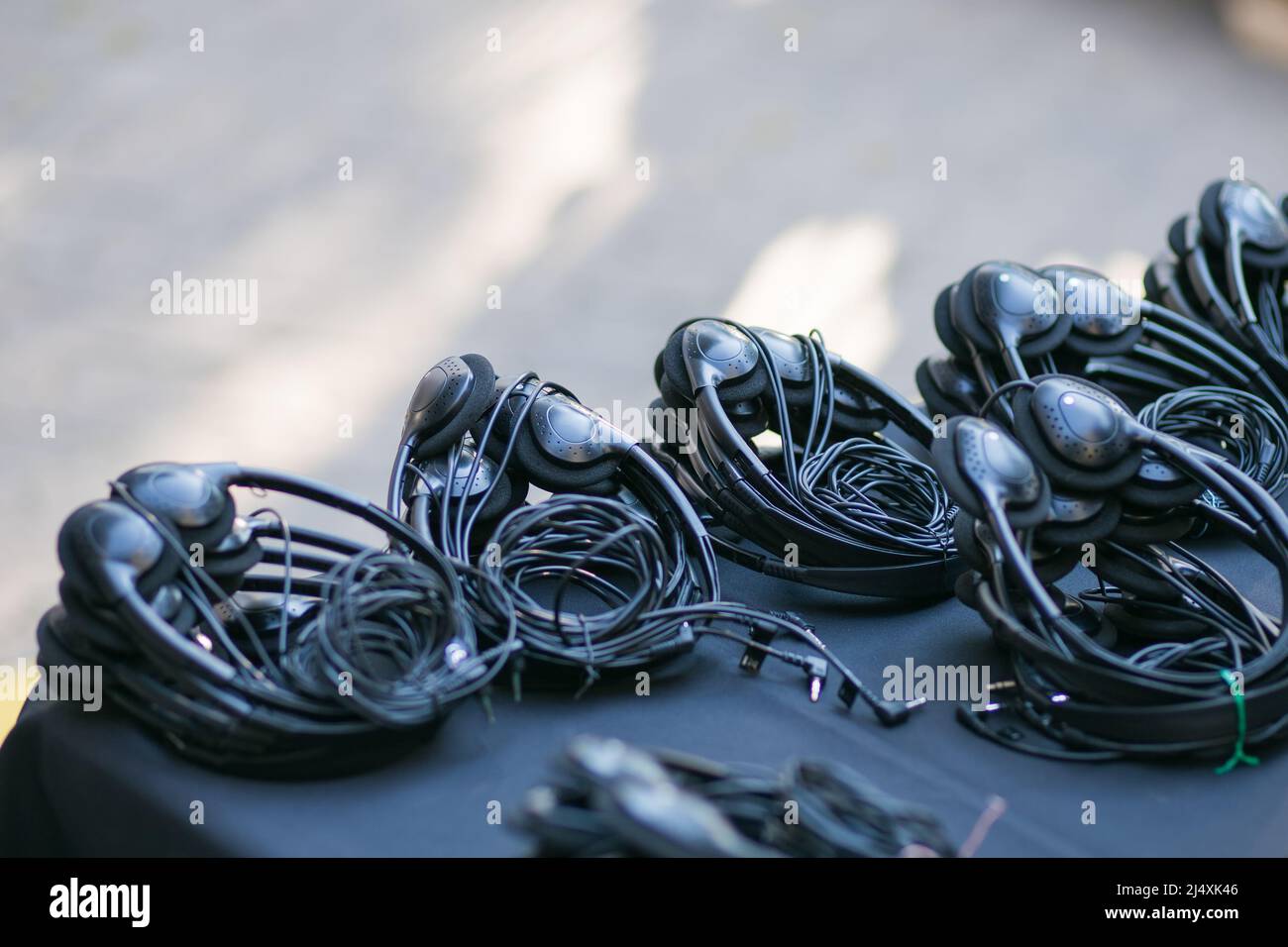 many phones at the table prepared for seminar event Stock Photo