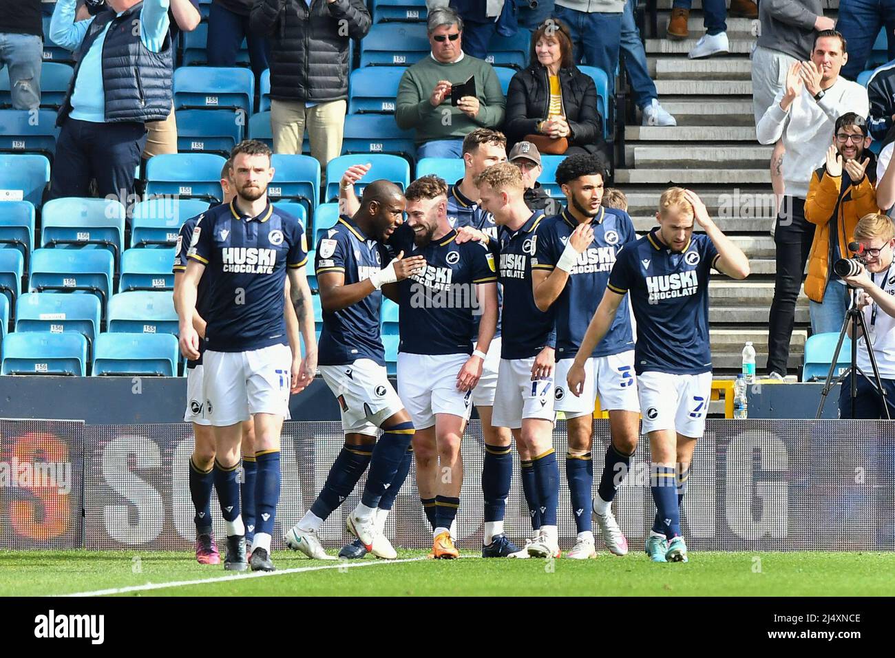 LONDON, UK. APR 18TH Tom Bradshaw of Millwall celebrating with his teammates after scoring his team's second goal during the Sky Bet Championship match between Millwall and Hull City at The Den, London on Monday 18th April 2022. (Credit: Ivan Yordanov | MI News) Credit: MI News & Sport /Alamy Live News Stock Photo