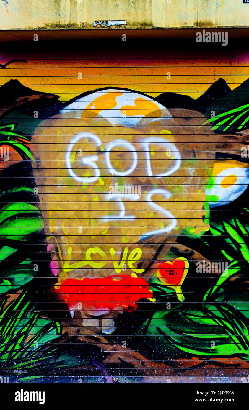 God is Love Street Art graffitii, Manchester, England Stock Photo