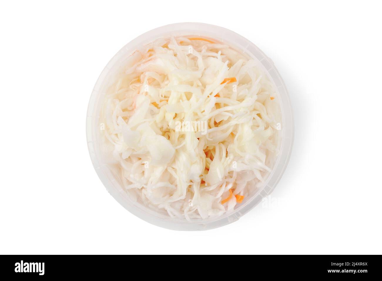 Sauerkraut with carrots in plastic container isolated on white Stock Photo