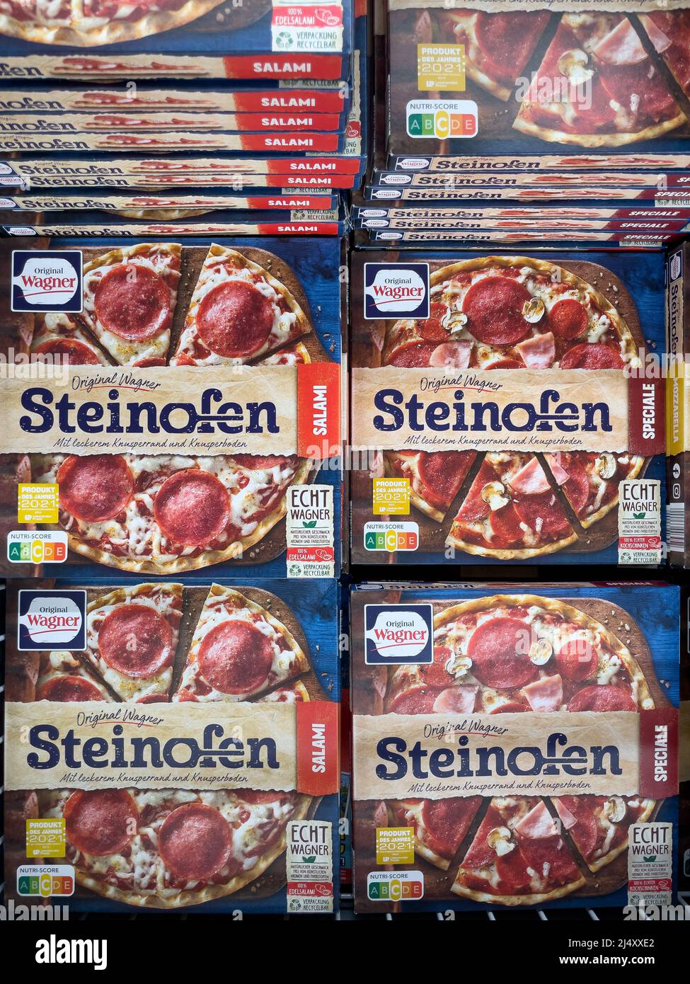 Nuremberg, Germany - April 04 2022: Frozen stone oven pizza in the supermarket. frozen pizza. Stock Photo