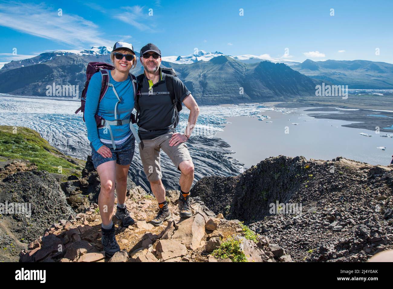 couple high above the Skaftafell glacier in south Iceland Stock Photo