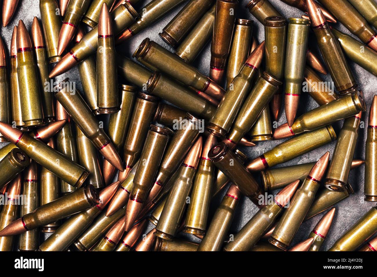 Bullets Background Texture Cartridges 7 62 Caliber For Kalashnikov Bullets Background Texture Cartridges 762 Caliber For Kalashnikov Assault Rifle Top View Flat Lay 2J4Y2DJ