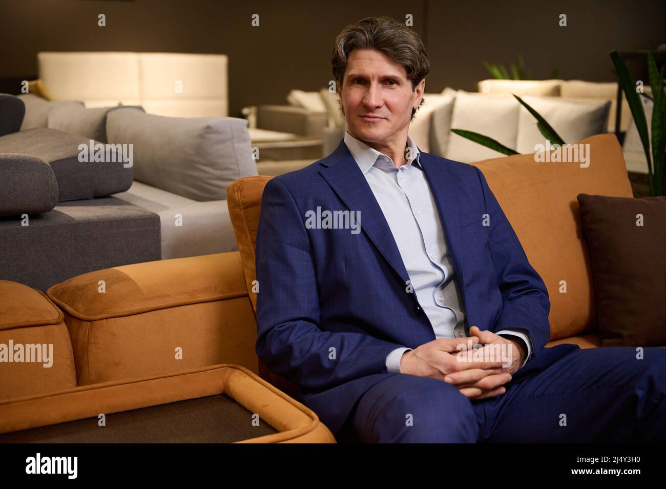 Handsome mature man in business suit, sales representative, retail