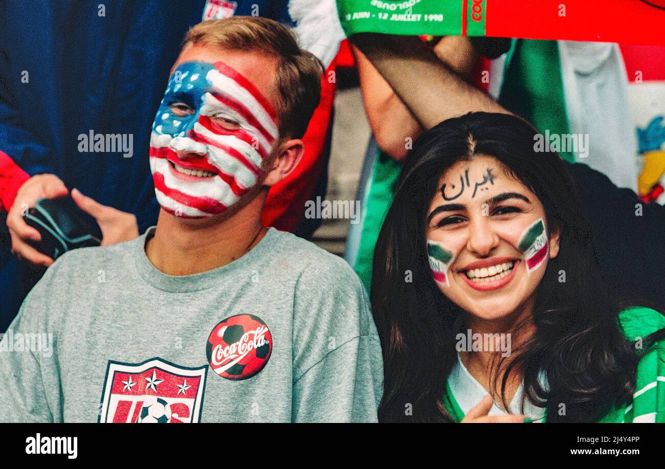 Lyon, France: Iranian and American soccer fans mingle during a 1998 World Cup match between the United States and Iran, on June 21, 1998, at the Stade Stock Photo