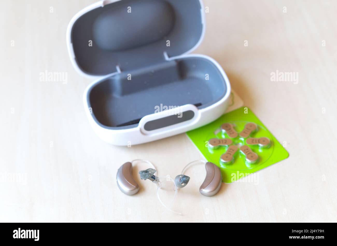 Aids for hearing loss, hearing aids with batteries and casket Stock
