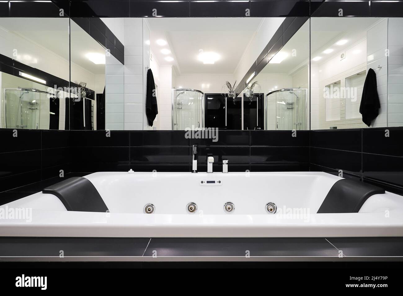White jacuzzi tub in modern bathroom interior Stock Photo