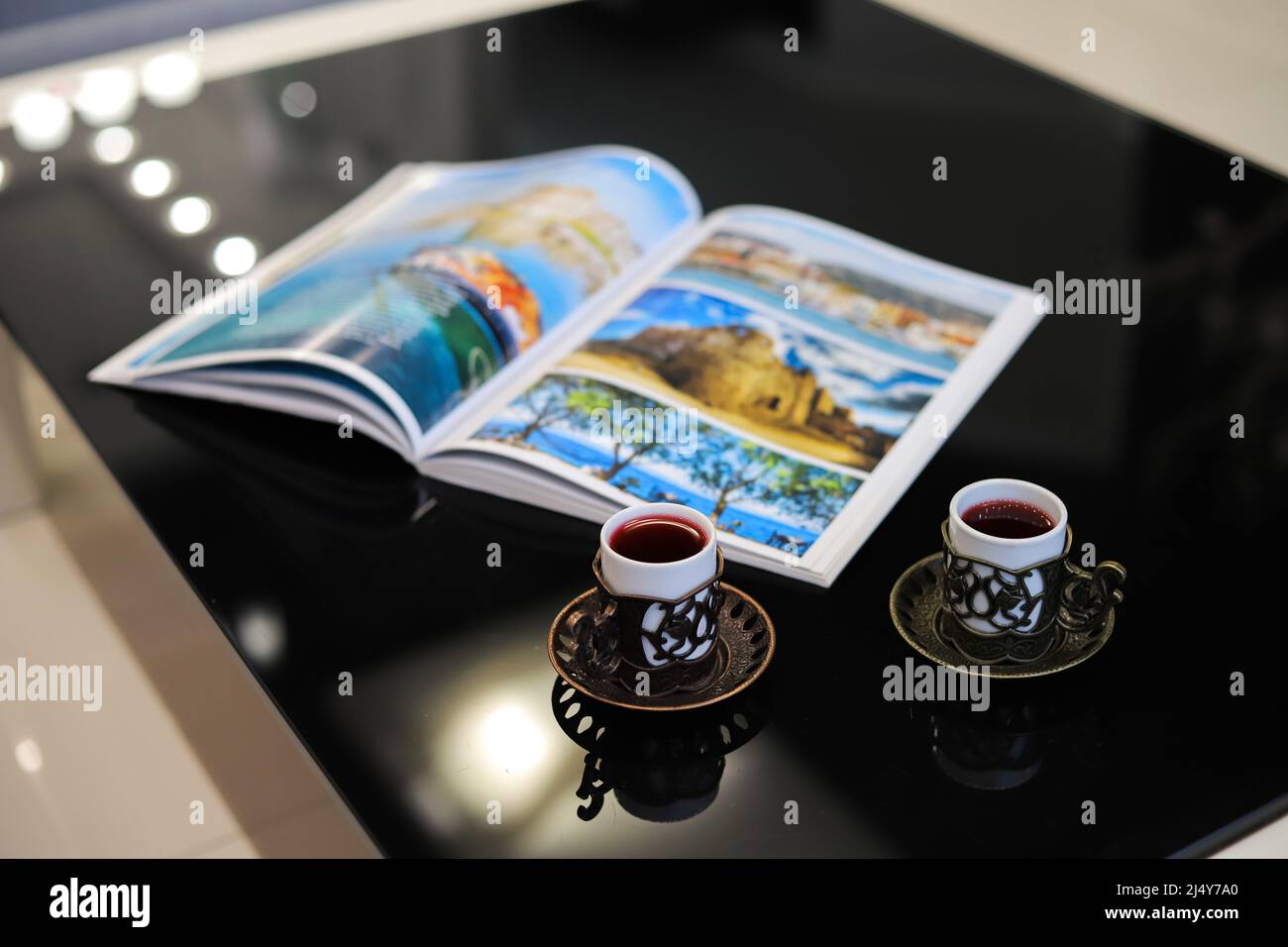 Open magazine on table hi-res stock photography and images - Alamy