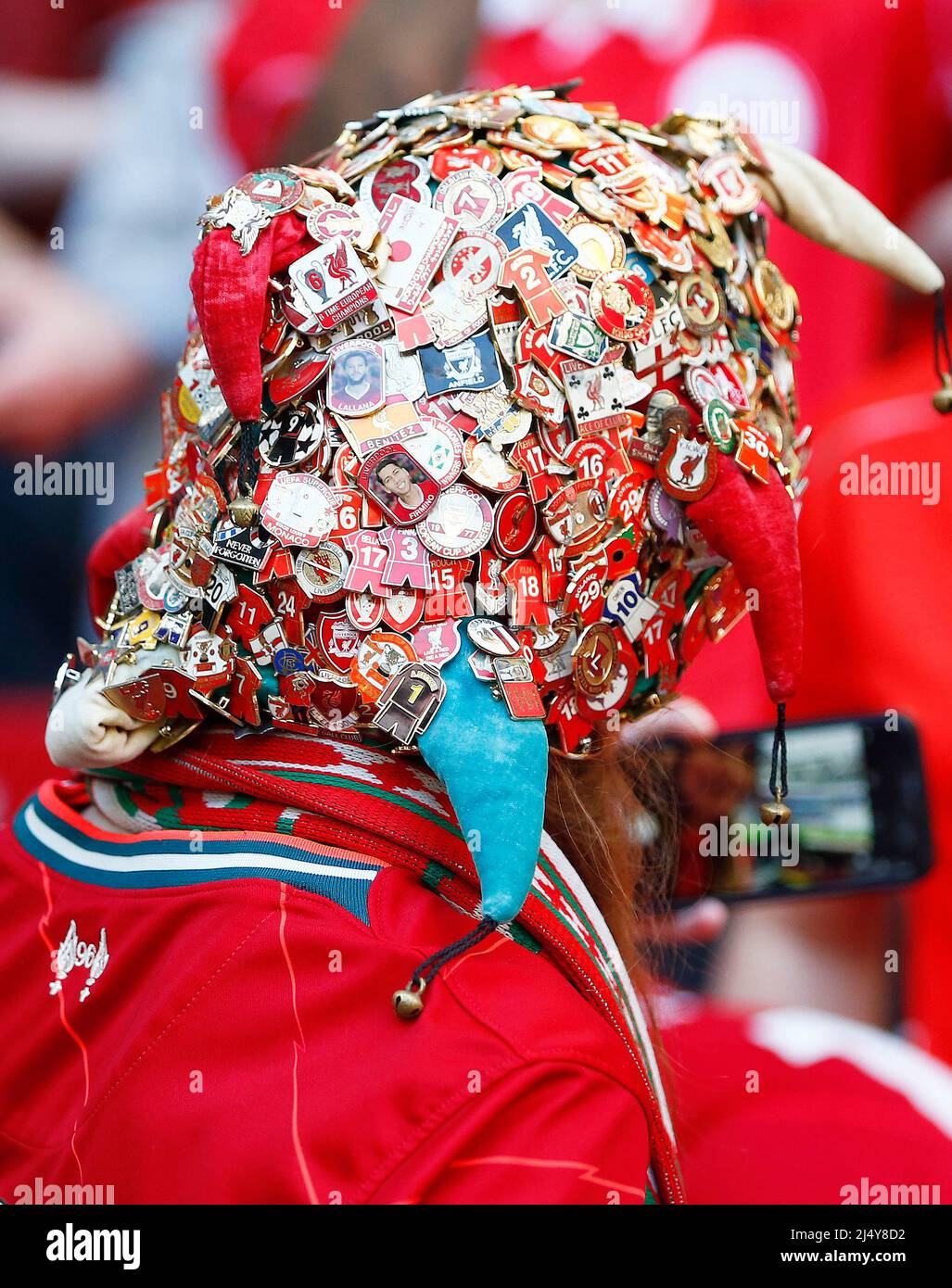 LONDON, ENGLAND APRIL 16 Liverpool Fan wearing loads of Football badges on her hat during FA