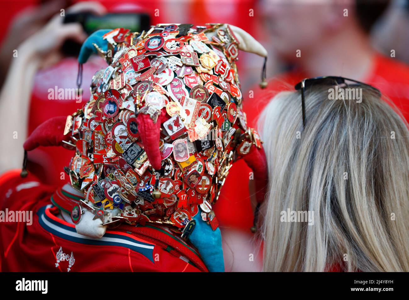 LONDON, ENGLAND APRIL 16 Liverpool Fan wearing loads of Football badges on her hat during FA