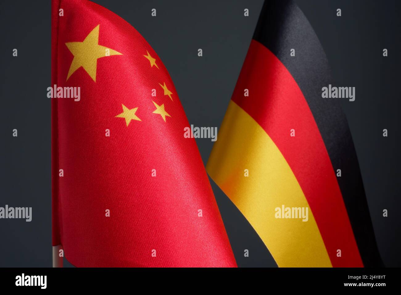Flags of China and Germany. Relationships of countries concept. Stock Photo