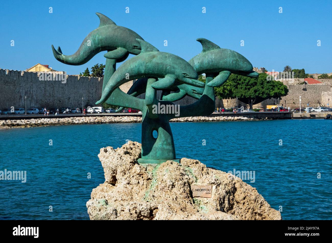 Rhodes, Greece - 28 September, 2021, The dolphin statue at the beach, Rhodes town, Greece, Stock Photo