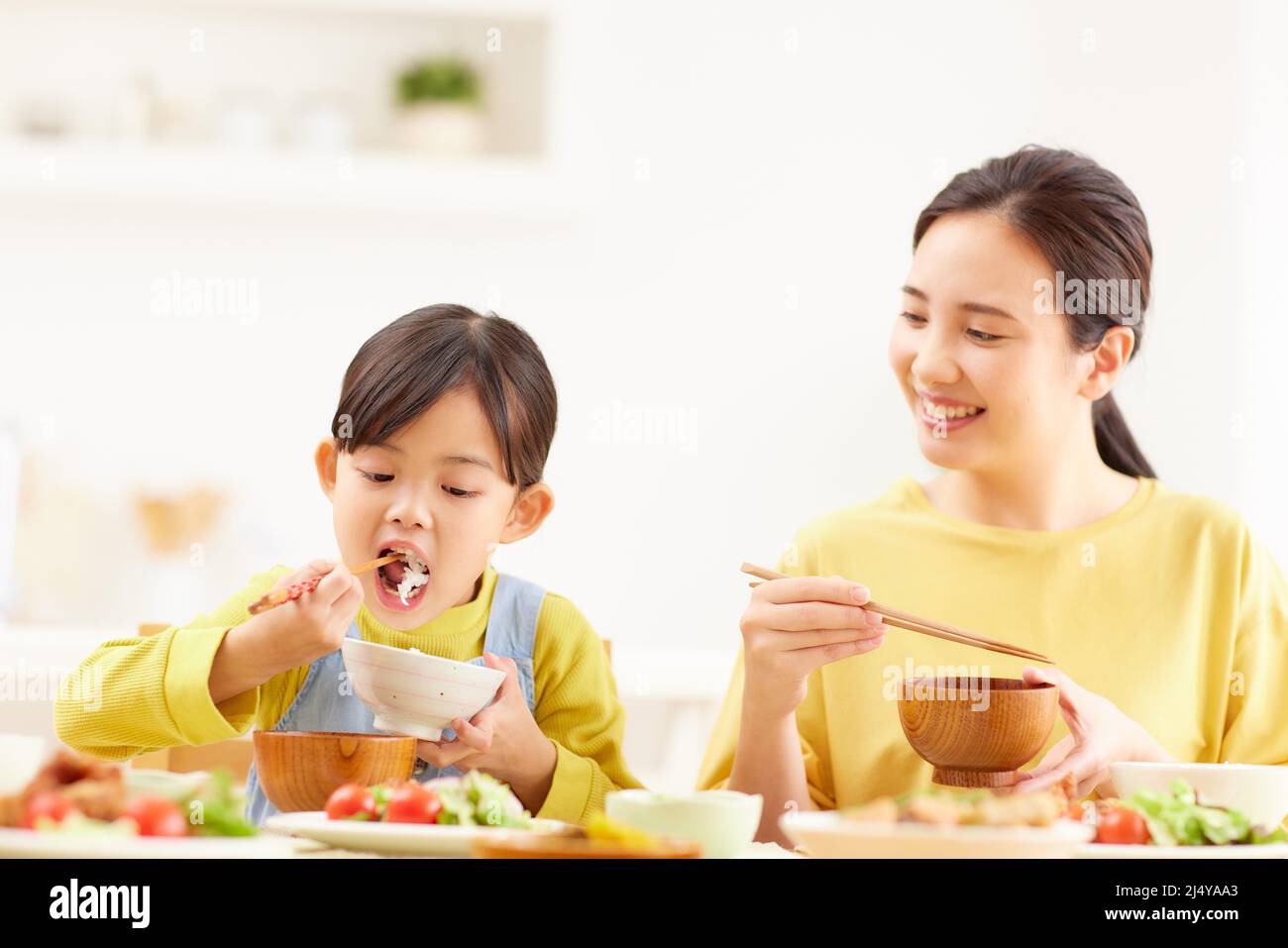 Japanese family eating together at home Stock Photo Alamy