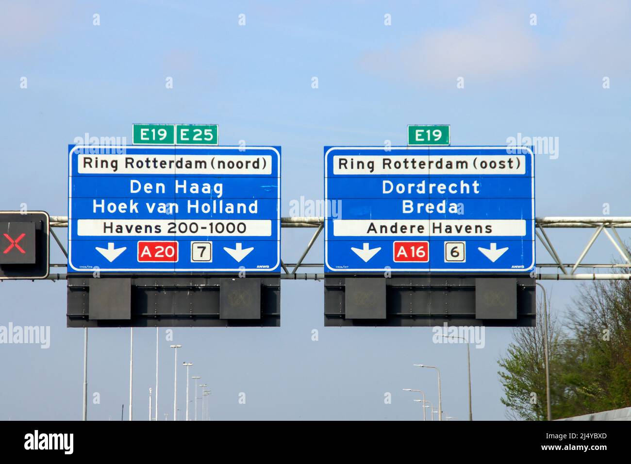 Blue Direction sign for the directions on Motorway A20 for directions