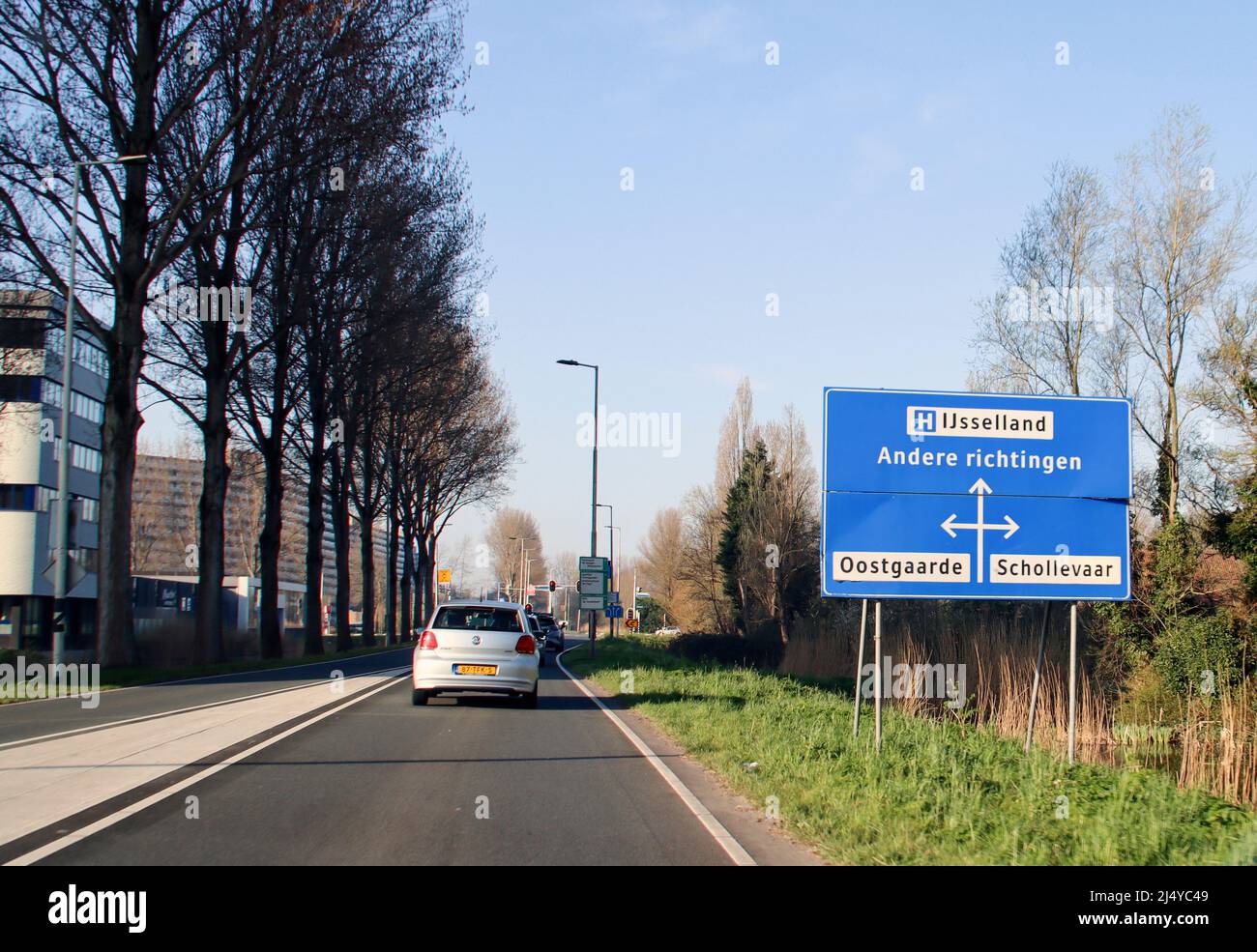 Blue direction and information sign for the directions on Motorway N219 for Oostgaarde and Schollevaar in the Netherlands Stock Photo