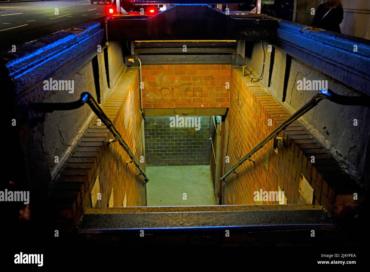 Illuminated Subway Entrance at Night, Kenmore Square, Boston, Massachusetts, USA Stock Photo