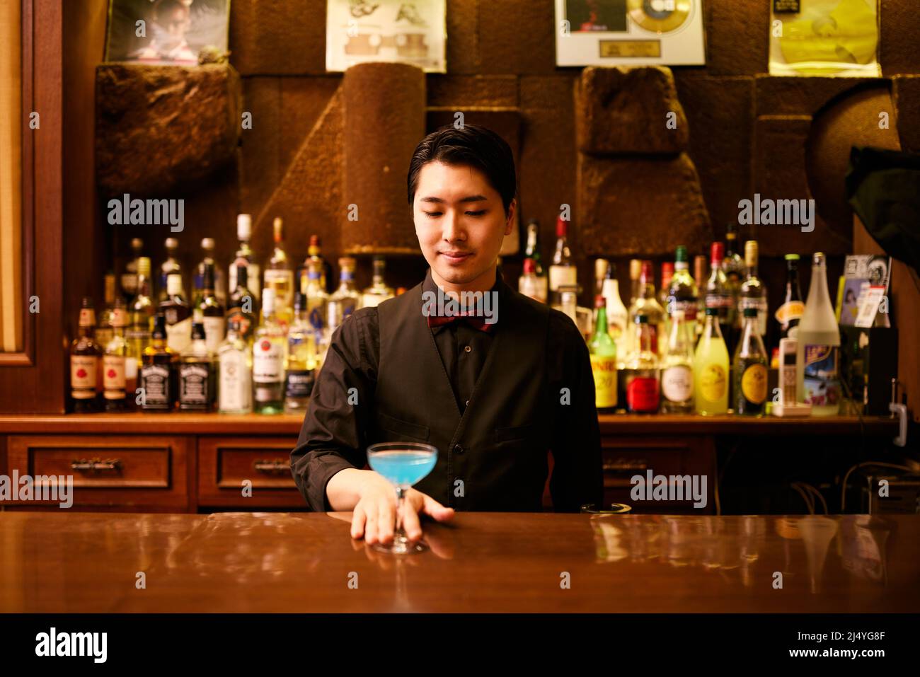 Japanese bartender serving a drink Stock Photo Alamy Japanese bartender serving a drink Stock Photo Alamy