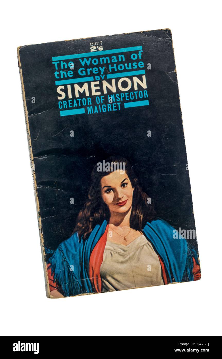 An old battered paperback copy of The Woman of the Grey House by Georges Simenon.  First published in 1933. Stock Photo