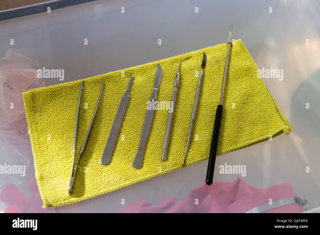 medical metal instrument. Sharp scalpels and tweezers for medical