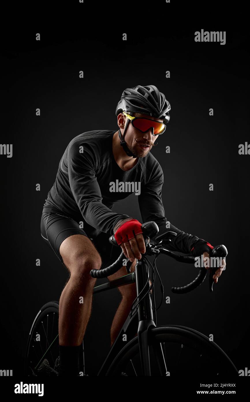 Professional cyclist training riding bicycle hi-res stock photography ...