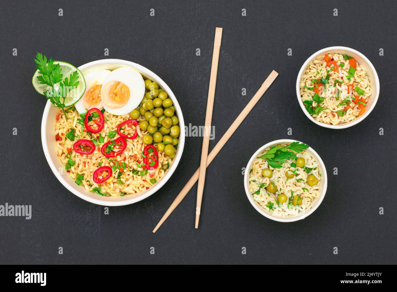 Beautiful Noodle Dish with Green Pea, Eggs, Red Hot Pepper and Greens