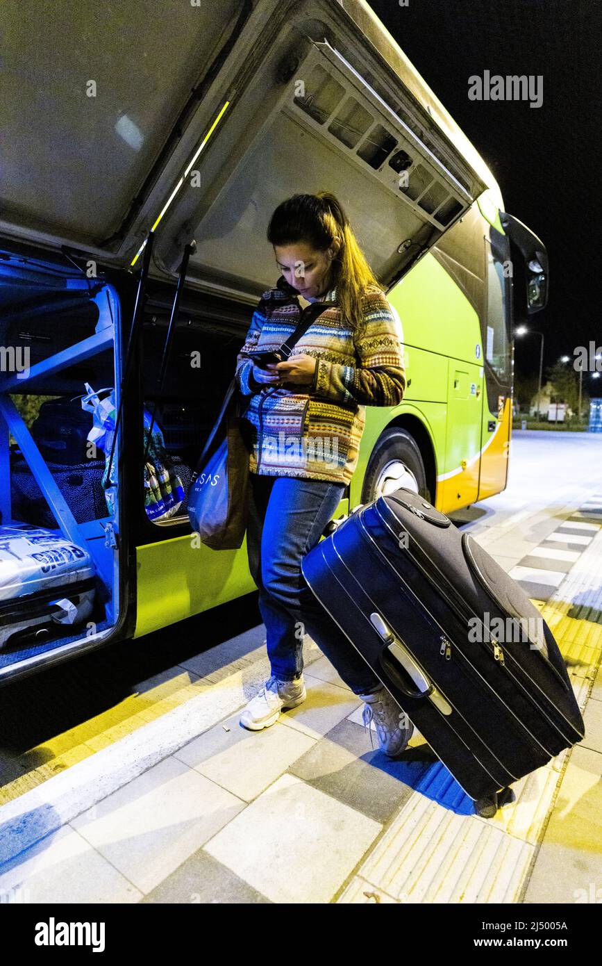 2022-04-18 22:55:11 MAASTRICHT - Luggage of travelers is loaded into the  Flixbus with the final destination Kiev. The bus company will resume bus  trips to Ukraine. Due to the war in Ukraine,