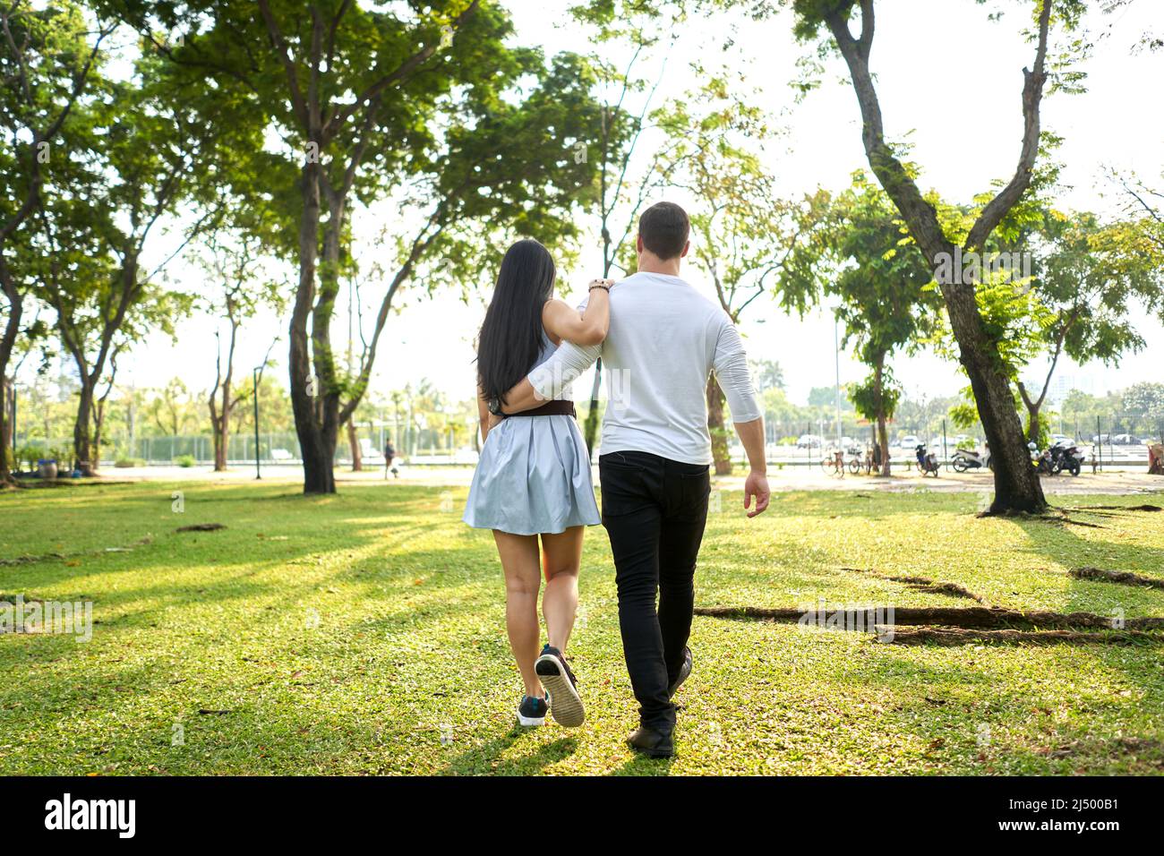 Person walking urban park hi-res stock photography and images - Alamy