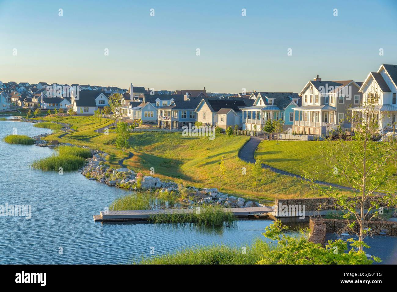 Residential houses at Daybreak in South Jordan, Utah with Oquirrh Lake
