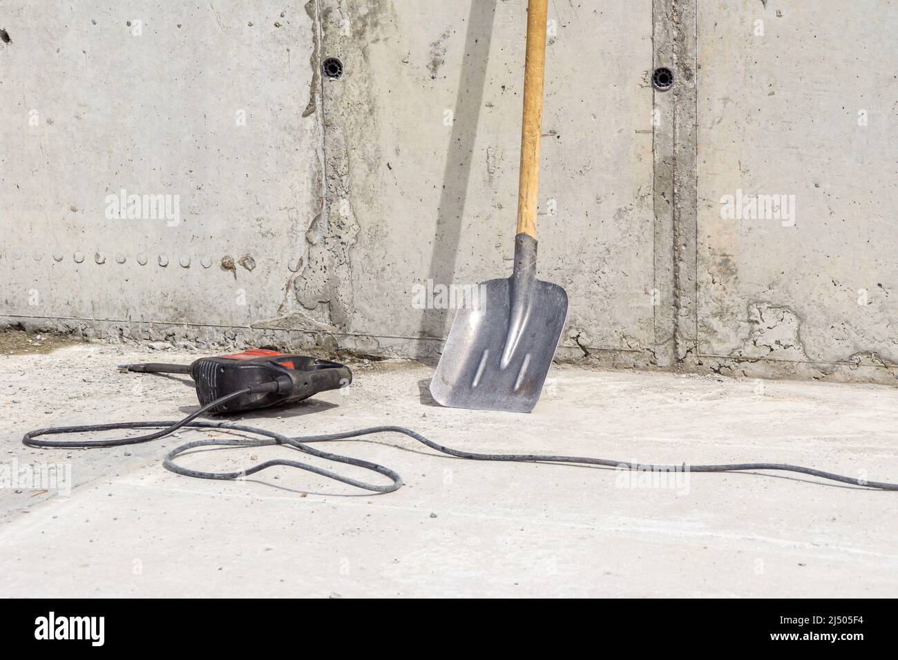 cleaning the walls from excess hardened mortar after dismantling the