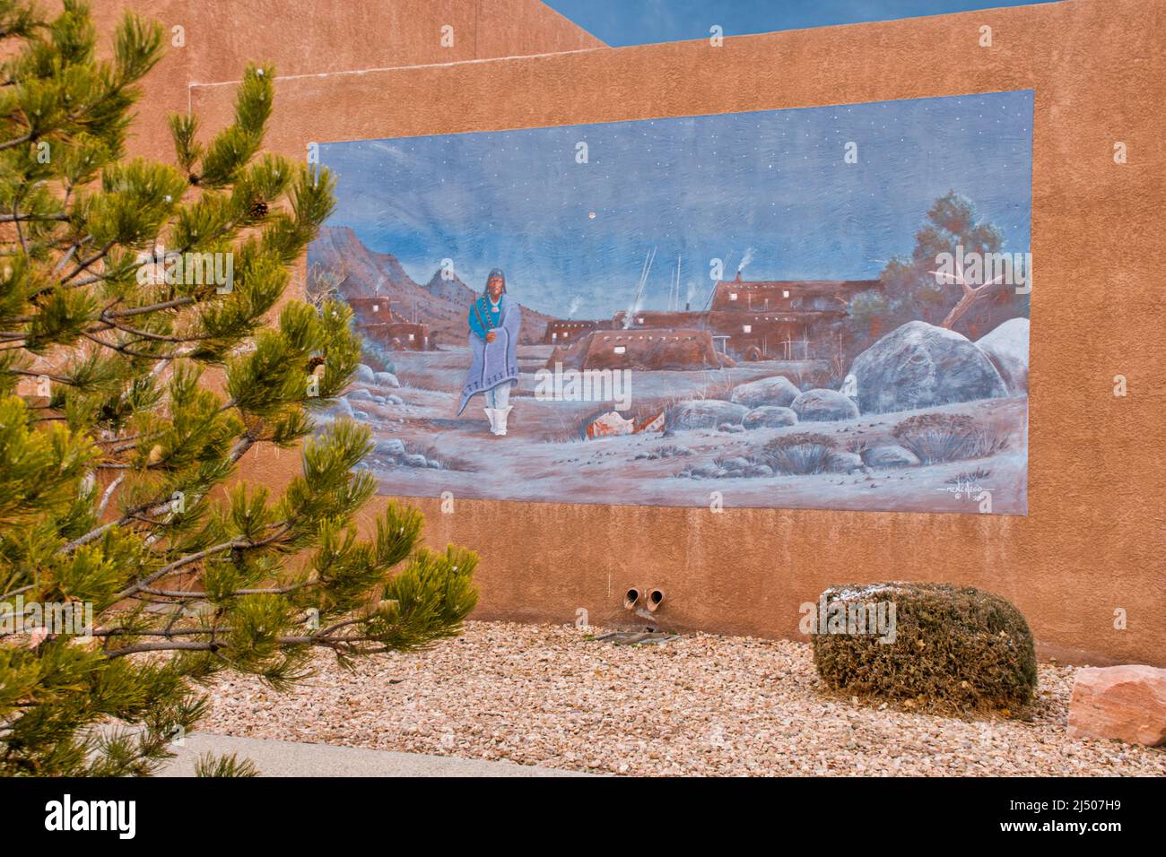 Mural of a Native American Indian at his pueblo outside the Pueblo