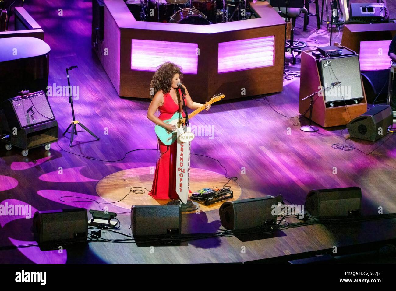 Hannah Dasher performs on the stage of The Grand Ole Opry, home to country music in Nashville, Tennessee. Stock Photo