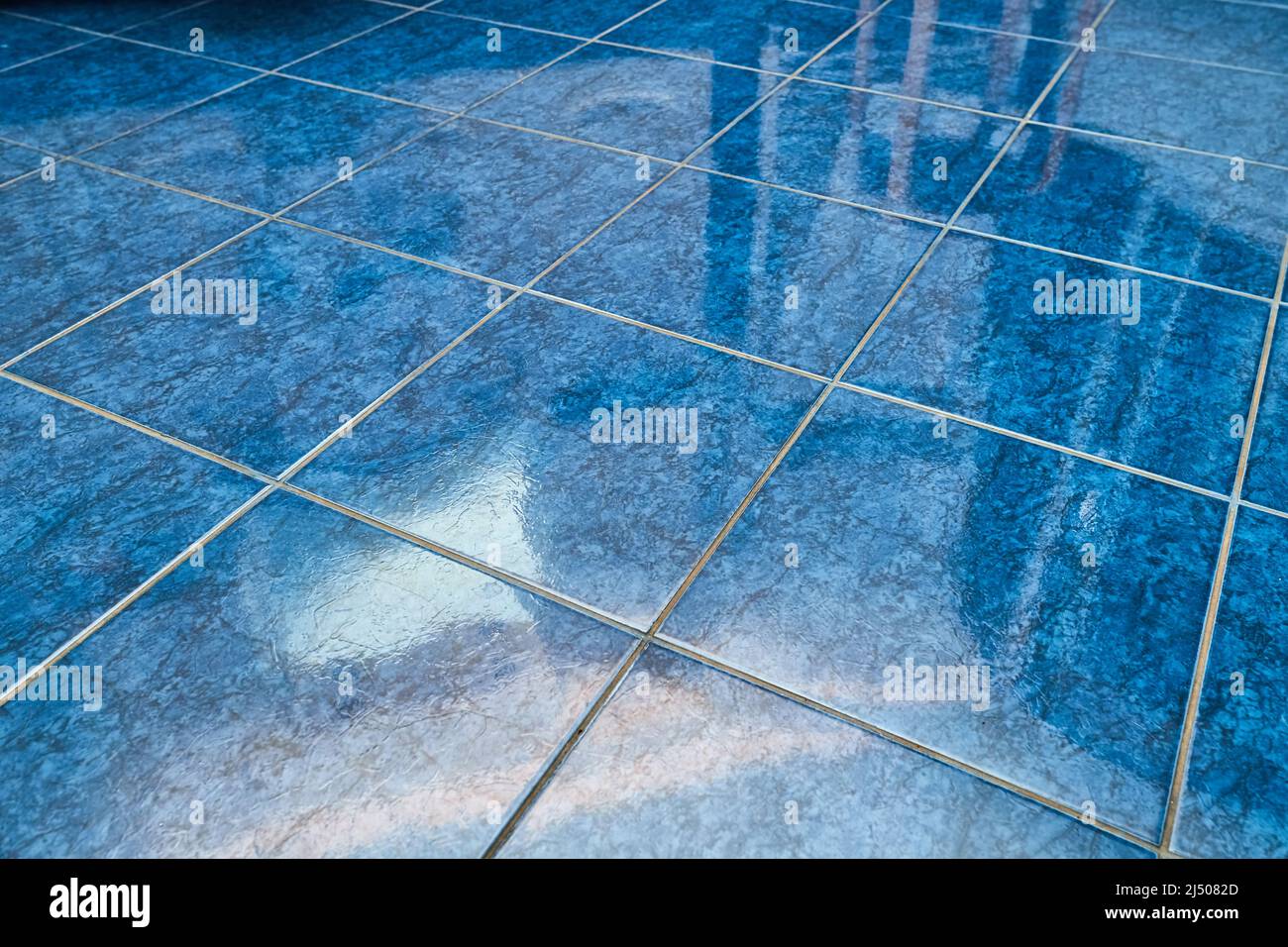 Tiled bathroom floor Stock Photo