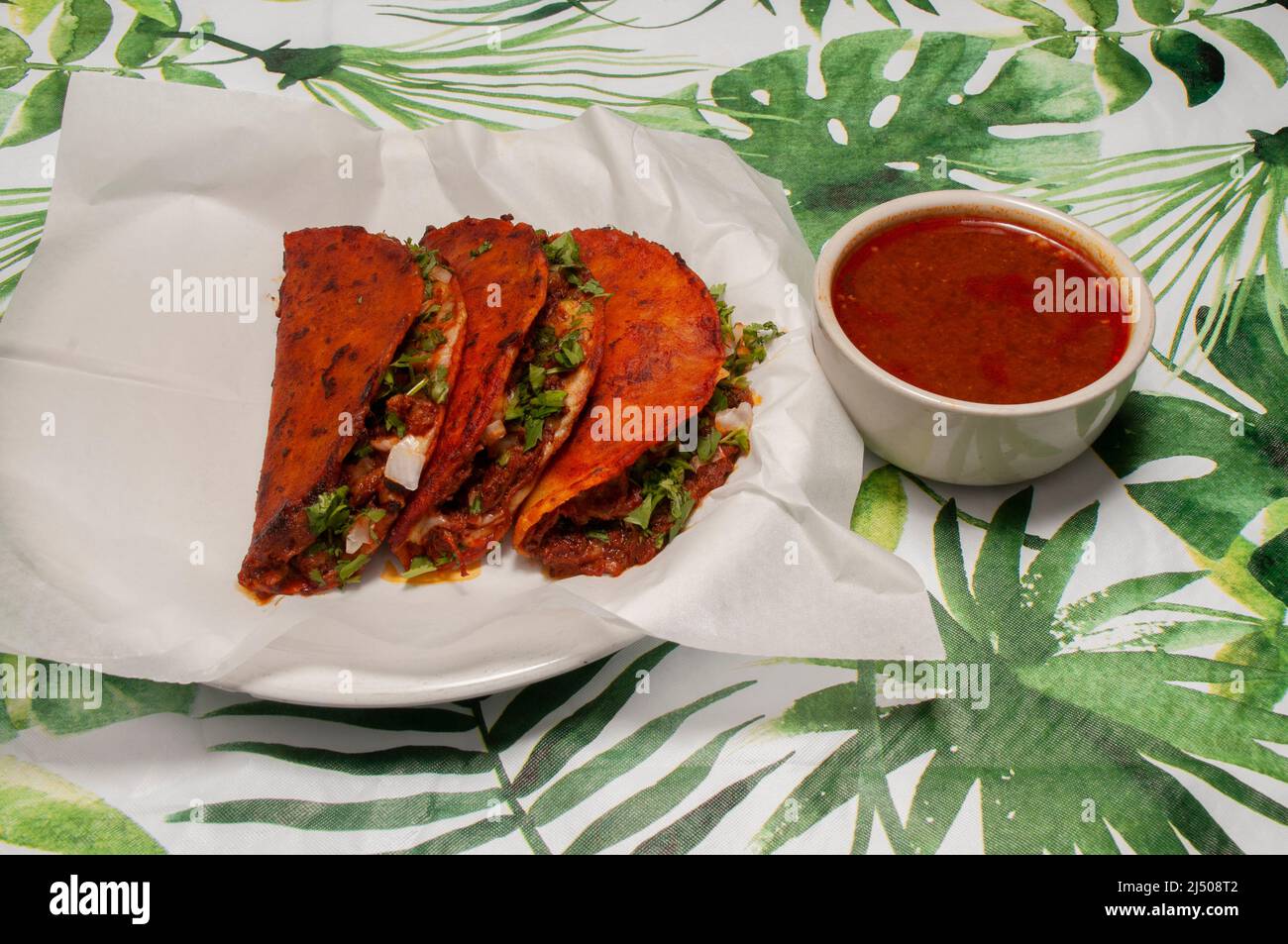 Authentic tex mex mexican cuisine known as Birria Tacos With Consomme