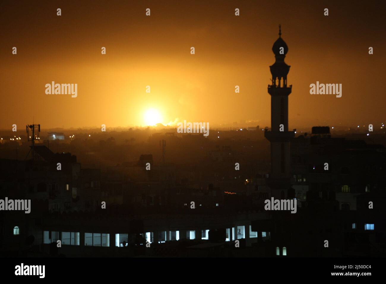 Khan Younis, Gaza. 18th Apr, 2022. Flames and smoke rise during Israeli air strikes in Khan Younis in the southern Gaza Strip, on Tuesday, April 19, 2022. Photo by Ismael Mohamad/UPI Credit: UPI/Alamy Live News Stock Photo