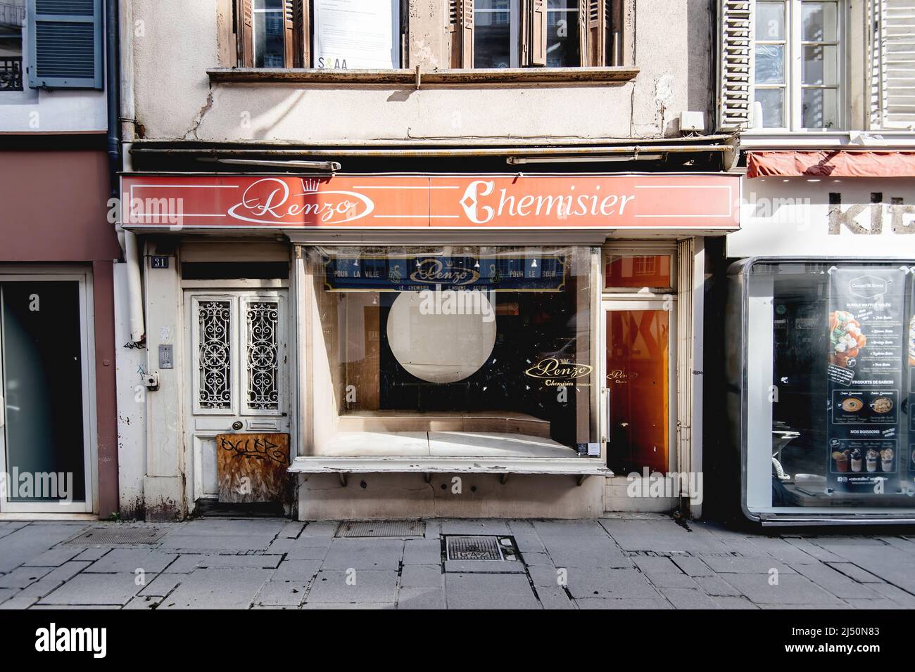 Strasbourg, France - Apr 11, 2022: Permanently closed iconic business casual shirt store Chemiserie Renzo on 31 Rue du Vingt-Deux Novembre Stock Photo