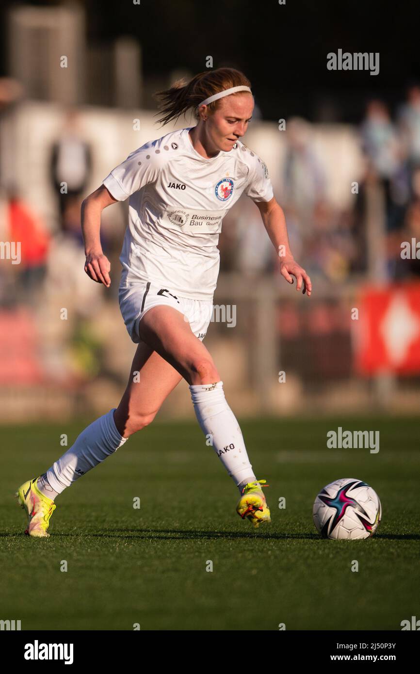 Leverkusen, Germany. 18th Apr, 2022. Soccer, Women: DFB Cup, Bayer Leverkusen - Turbine Potsdam, semifinal, Ulrich Haberland Stadium. Potsdam's Karen Holmgaard plays the ball. Credit: Marius Becker/dpa - IMPORTANT NOTE: In accordance with the requirements of the DFL Deutsche Fußball Liga and the DFB Deutscher Fußball-Bund, it is prohibited to use or have used photographs taken in the stadium and/or of the match in the form of sequence pictures and/or video-like photo series./dpa/Alamy Live News Stock Photo