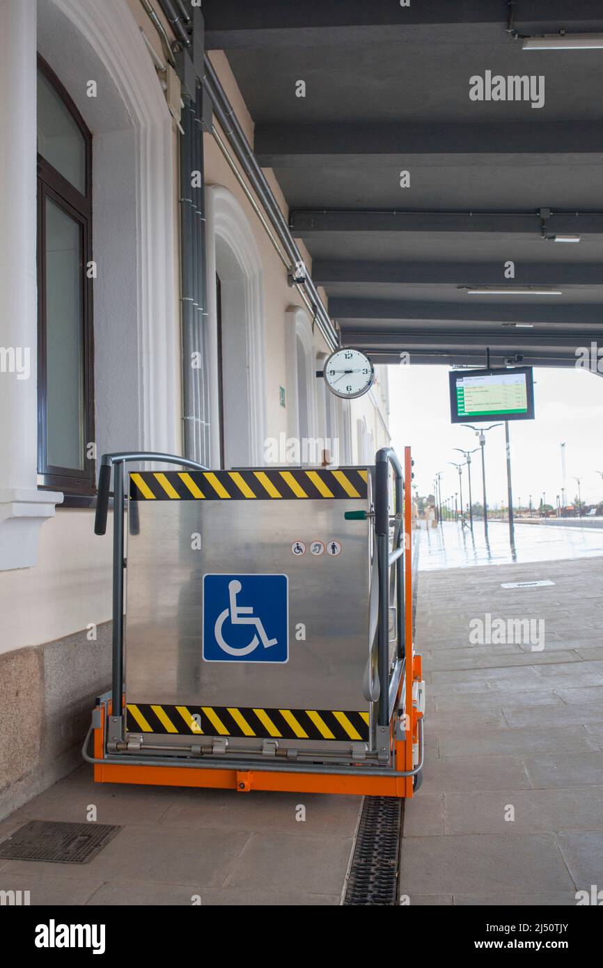 Special lift for wheelchairs at railway station. Assistance service for railway disabled passengers Stock Photo