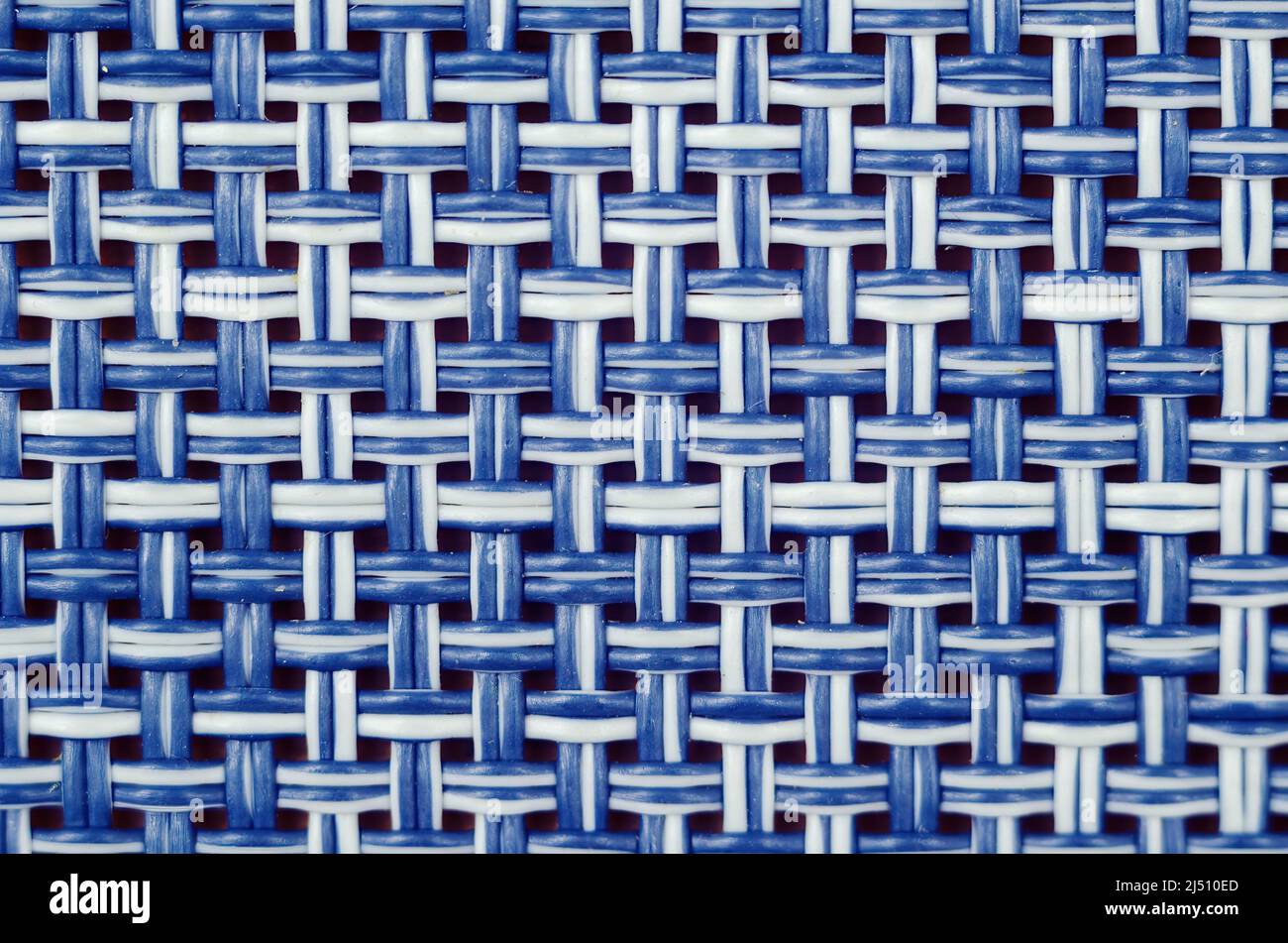 Texture of white and blue synthetic fabric. Perpendicularly woven white ...