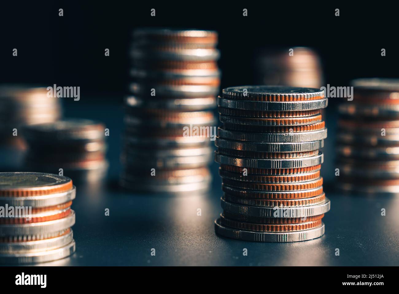 Pile of gold coins stack in finance treasury deposit bank account for