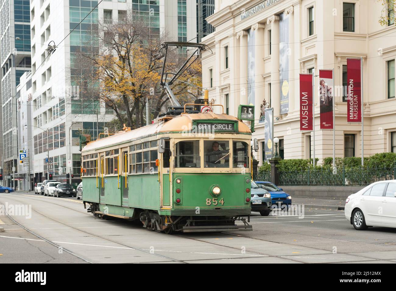 The City Circle tram on a cold Winters day in Melbourne Central, going past the Immigration Museum. Stock Photo