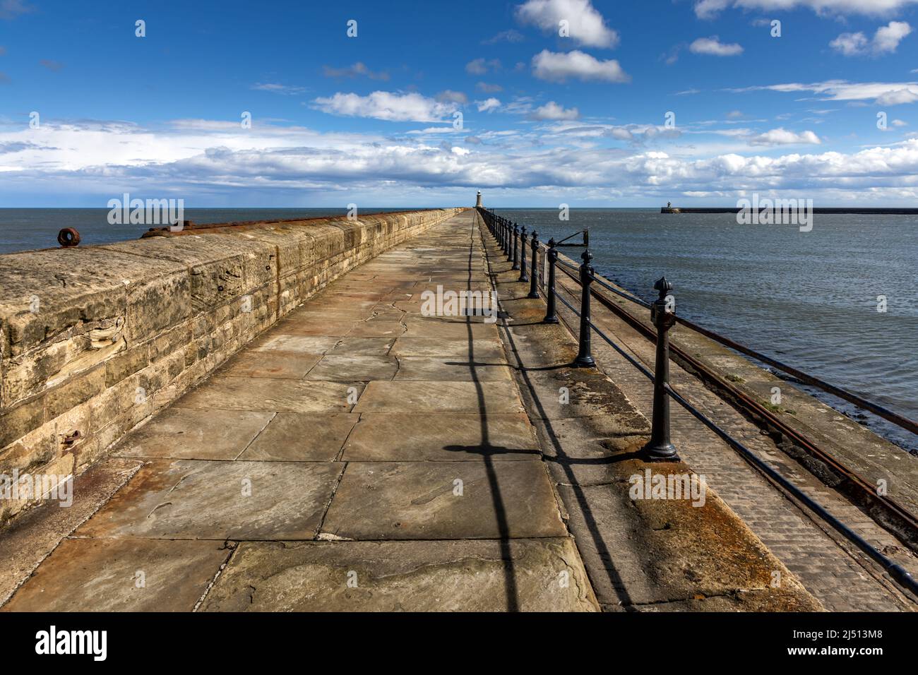 Tynemouth North Pier and Lighthouse at the mouth of the River Tyne,Taken on a sunny spring day. Stock Photo