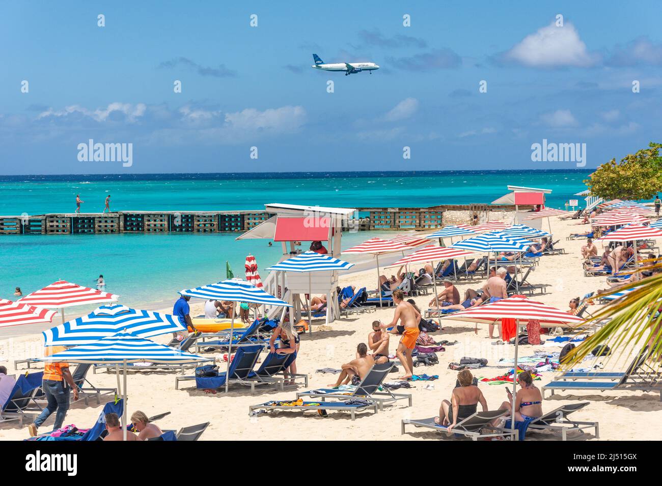 Aircraft landing over Doctor's Cave Beach,, Montego Bay, St James Parish, Jamaica, Greater Antilles, Caribbean Stock Photo