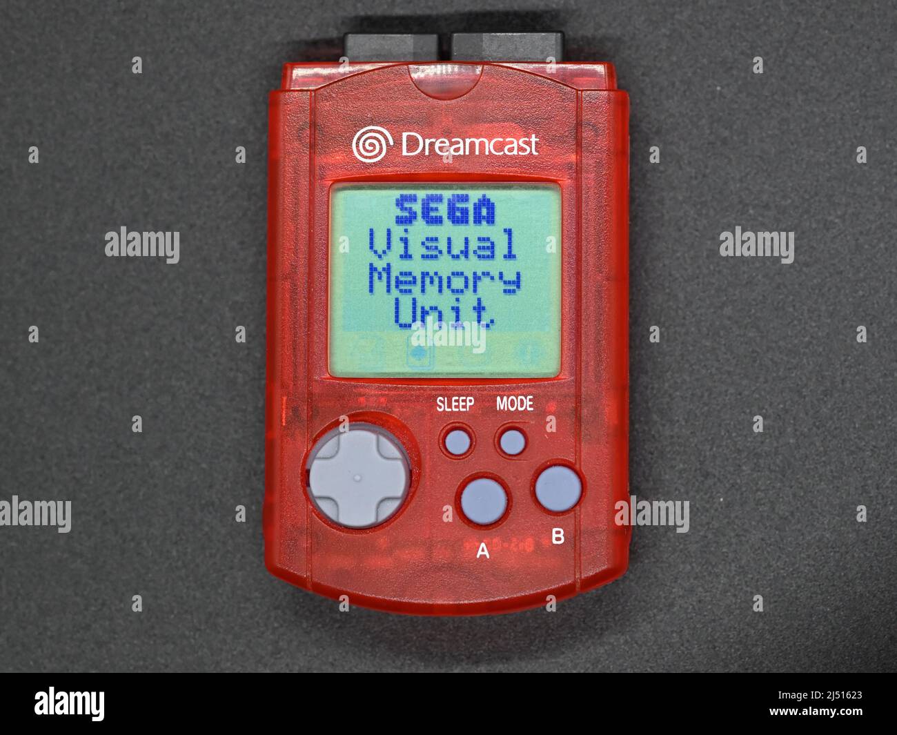 https://c8.alamy.com/comp/2J51623/red-sega-dreamcast-visual-memory-unit-or-vmu-with-power-on-and-lcd-display-viewable-on-a-dark-background-2J51623.jpg