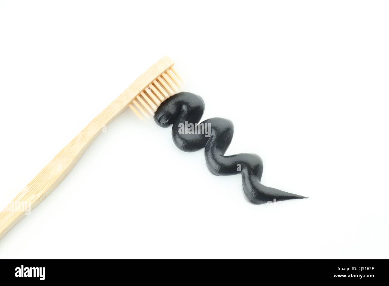 Toothpaste and toothbrush isolated on white background Stock Photo - Alamy