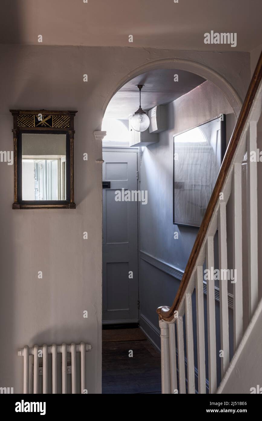 Arched entrance hall in Grade II listed 1820s London cottage, UK Stock Photo