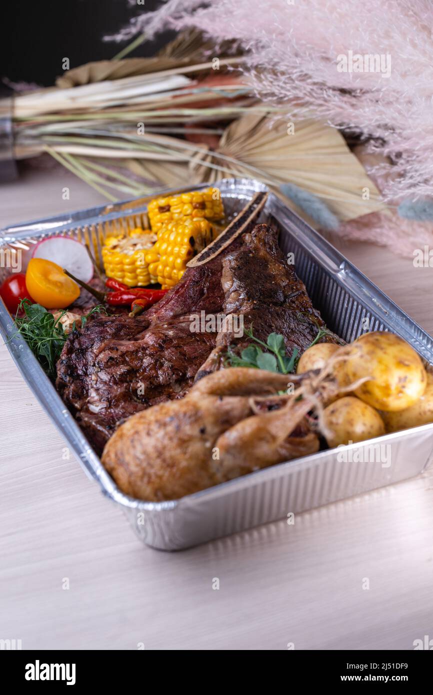 foil box with meat products. food delivery Stock Photo Alamy