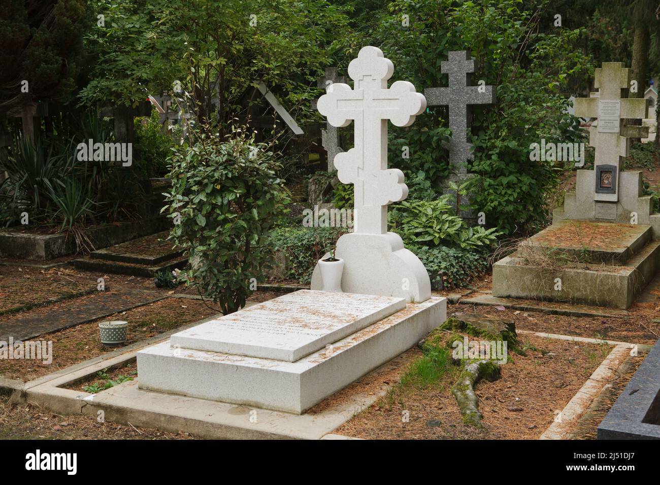 Grave of Grand Duke Andrei Vladimirovich of Russia (1879-1956) and his wife Russian ballerina Mathilde Kschessinska (1872-1971) known as Princess Romanovskaya-Krasinskaya after her marriage at the Russian Cemetery in Sainte-Geneviève-des-Bois (Cimetière russe de Sainte-Geneviève-des-Bois) near Paris, France. Their son Prince Vladimir Romanovsky-Krasinsky (1902-1974) is also buried in the grave. Stock Photo