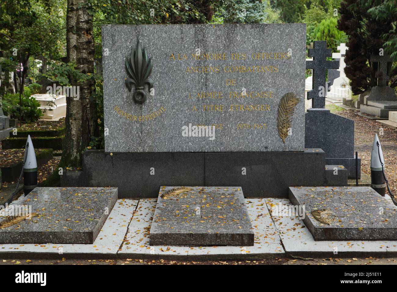Graves of Russian officers served in the French Army at the Russian Cemetery in Sainte-Geneviève-des-Bois (Cimetière russe de Sainte-Geneviève-des-Bois) near Paris, France. Russian-born French general and diplomat Zinovy Peshkov (Zinovi Pechkoff) is buried here among others. Stock Photo
