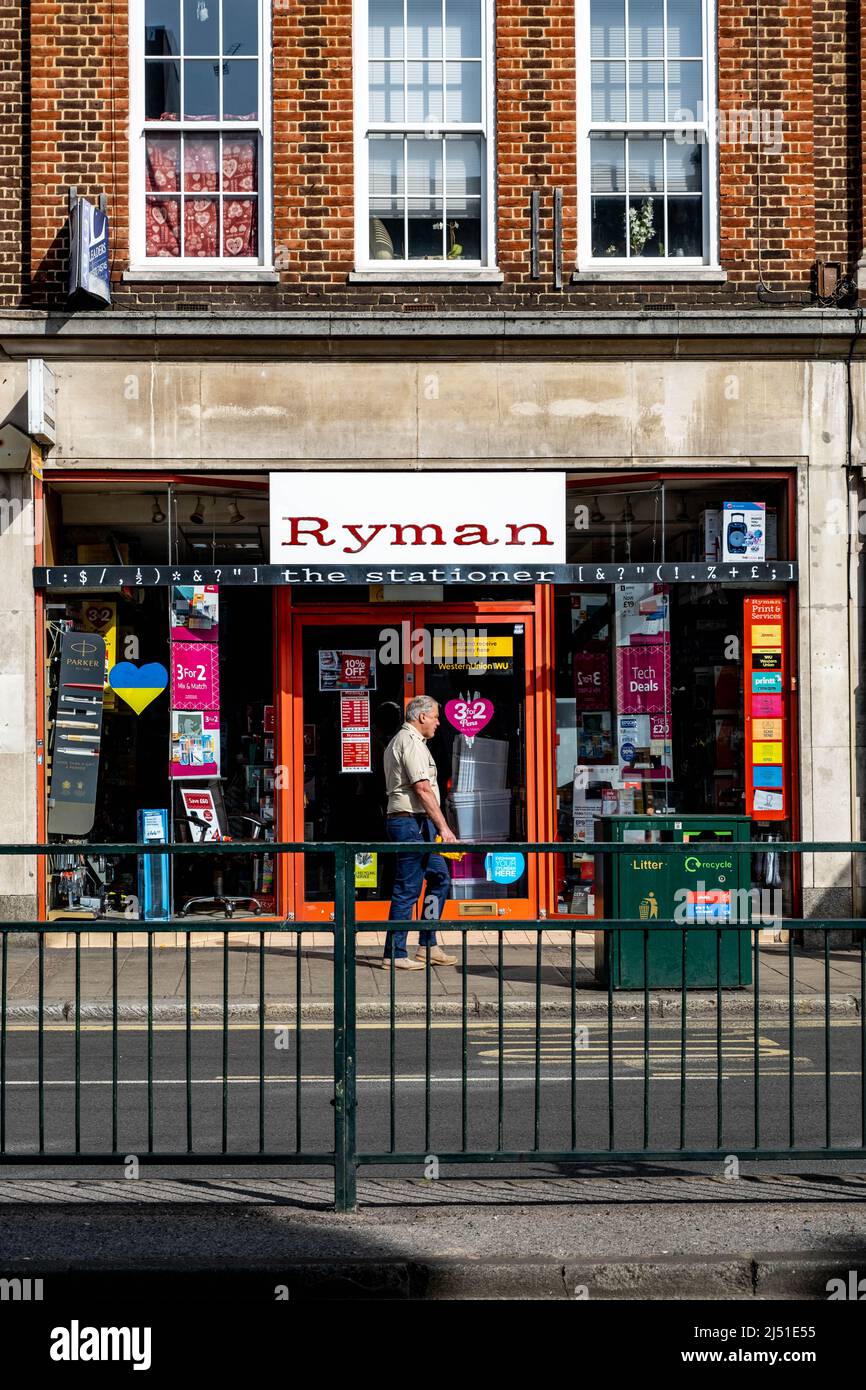 Epsom Surrey London UK, April 17 2022, Ryman Office Stationery Shop Front With Person Walking Past Stock Photo